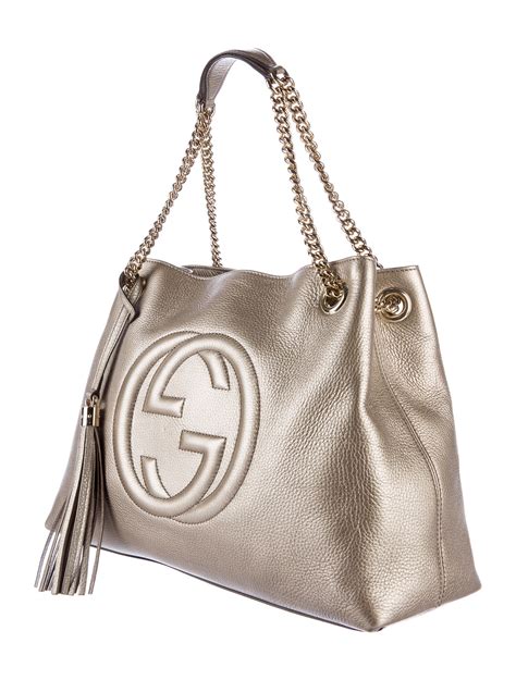 gold gucci purse|handbag with gold chain strap.